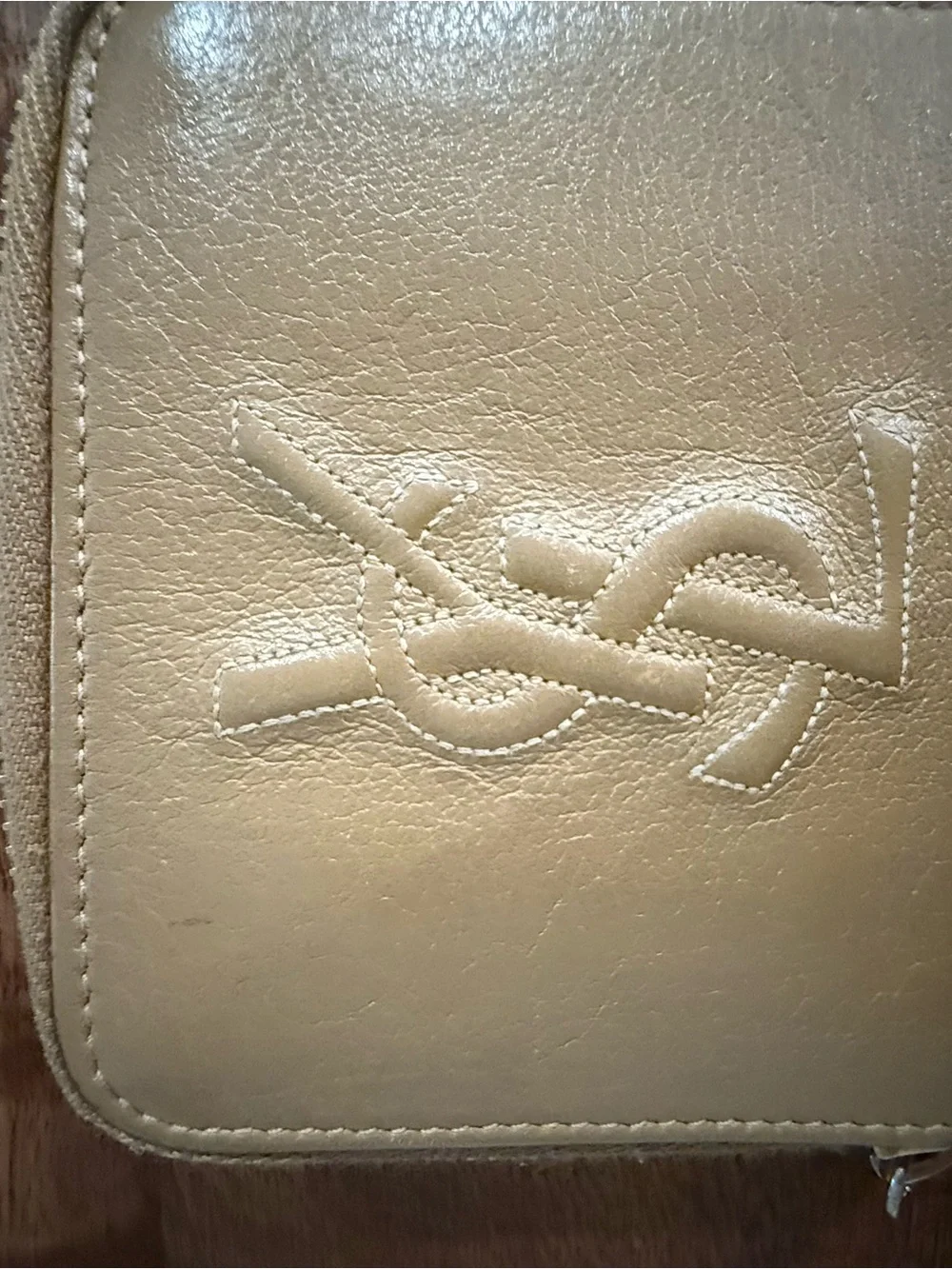 Yves Saint Laurent Embossed Logo Zip small Wallet in Light Beige